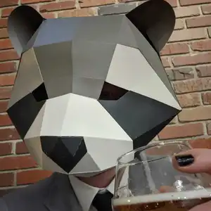 Profile photo of Kevin Abel wearing a mask that resembles a racoon